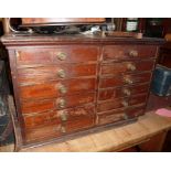 Victorian collectors table chest of 12 drawers with compartments and brass handles