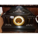 Victorian marble mantel clock with brass dial flanked by six columns
