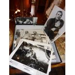 Large quantity of various black and white press photos and film stills