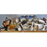Porcelain coffee set, owl figurines, carved elephants, etc. (one shelf)
