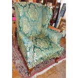 Georgian style winged armchair upholstered in green