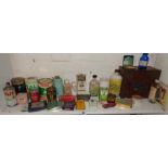 Shelf of vintage advertising tins and packets