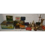 Old toffee and tobacco tins with assorted brassware (shelf of)