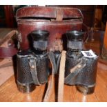 WW2 binoculars in leather case and a Sam Browne belt