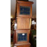 Pair of oak and glazed wall medals display cases
