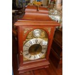 Modern triple chiming 8 day bracket clock with brass dial and silvered chapter ring in mahogany case