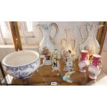 Shelf of assorted porcelain and china, inc. figurines, vases and a chamber pot