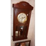 Oak wall clock and a dressing table mirror
