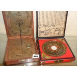 Feng Shui calculator in case and a reproduction brass pocket "San Francisco Bay" sundial in wood box