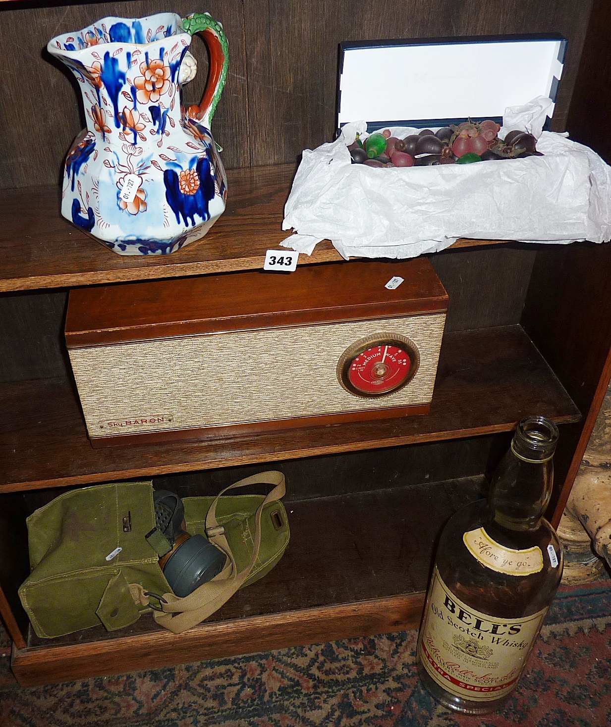 A retro Sky Baron radio, box of glass grapes, a Mason Ironstone Imari jug and a gas mask!