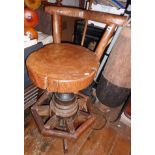 Carved rustic swivelling bar stool on 17th c. Capstan base