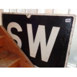 Original cast iron Great Western railway sign "S W" (sound whistle) in black and white