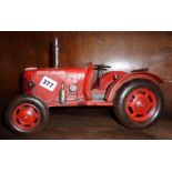 Modern painted tin plate model of an old David Brown tractor