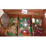 Wooden box containing jewellery, powder compact, cherry bakelite beads, enamel badges, cameo