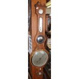 Early 19th c. crossbanded mahogany wheel barometer by F. Amadio & Sons of London