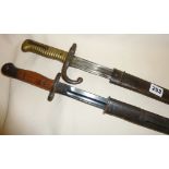 WW1 Lithgow SMLE bayonet and scabbard together with a 19th c. French bayonet with scabbard dated
