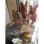 Three Oriental carved hardwood figures, two Indian wood fabric printing blocks and a lacquer box