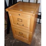 Modern light oak filing cabinet of two drawers