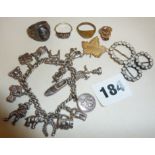 Vintage charm bracelet with some silver charms, silver rings inc. an ornate gents Niello signet