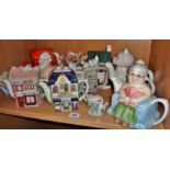 Shelf of novelty teapots