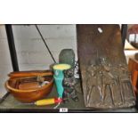 Shelf of treen and metalware, inc. corkscrew, Arts & Crafts copper plaque depicting knights and lady