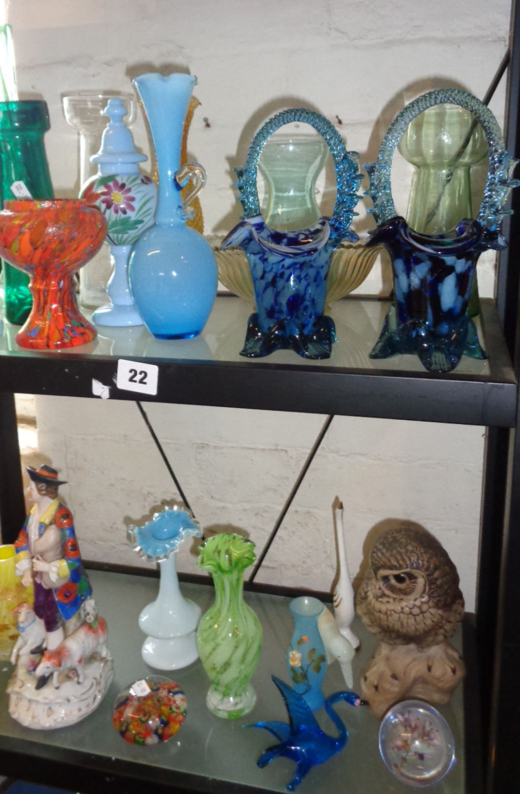 Two shelves inc. coloured glassware, hyacinth vases and Poole Pottery stoneware owl