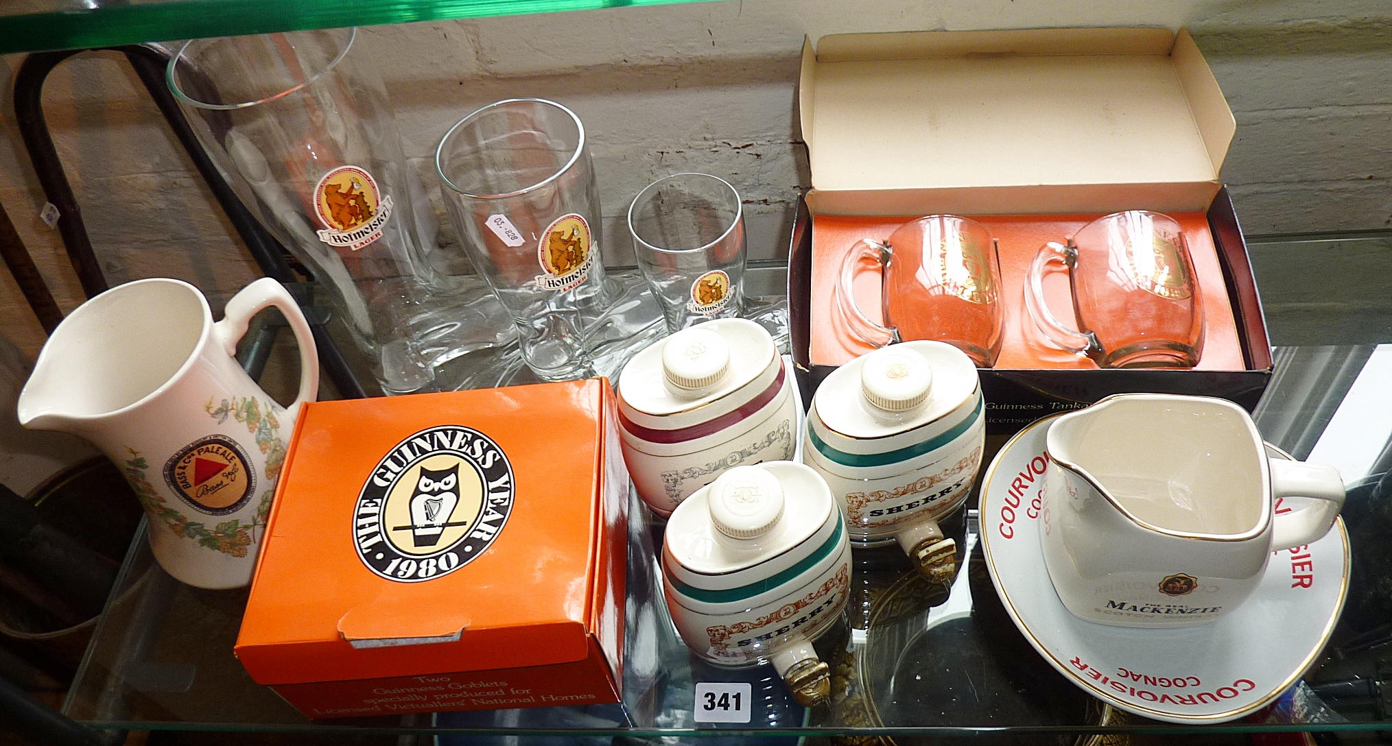 Collection of china and glass brewery items, inc. three small Wade spirit barrels etc.