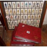 Framed set of Player's Cigarette Cards together with three albums full of similar