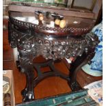 Chinese carved hardwood stand with marble inset top