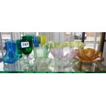 Large quantity of coloured glass, inc. Bristol green and blue wine glasses, two Carnival glass