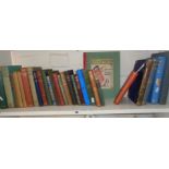 Shelf of hardback books, by Kipling, Belloc, H.G. Wells etc., and a children's book - Sam the
