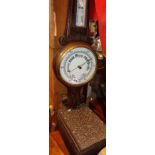 Folk Art carved wooden box and an oak banjo barometer