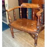 19th c. mahogany Smokers bow pub chair curved top rail on turned supports and legs with stretchers