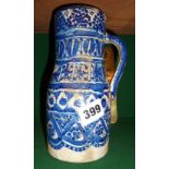 Iznik pottery jug with blue and white geometric decoration (A/F)