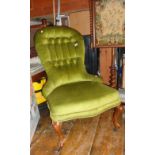 Victorian upholstered button-back nursing chair with carved cabriole legs