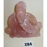 Antique Chinese carved rose quartz figure of a seated scholar (11cm high)