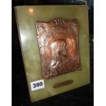 A Salvator Mundi copper plaque mounted on a brass backed onyx panel by Ch. Haag