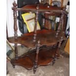 Victorian walnut 3 tier serpentine fronted whatnot on turned supports