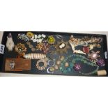 Tray of vintage jewellery, inc. lucite rings, Murano type glass beads, mother of pearl etc.