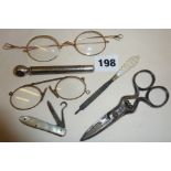 Antique gold? (untested) rimmed spectacles and pince-nez, small penknife, scissors, and