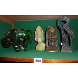 Three African carved soapstone figures and a Ngwenya glass water buffalo figure