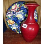 Chinese Sang de Boeuf bottle vase, 26cm, and a Maling china plate with floral tube lined decoration,