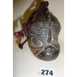 Tibetan ceramic bell in the form of a monkey's head (12cm high), incised signature to base