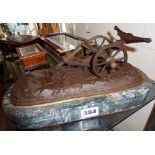 Victorian bronzed cast iron model of a two wheeled plough on marble base