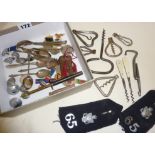 Folding corkscrews, police buttons, spoons, coins and a Chelmsford City Football Supporters Club