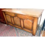 Oak coffer with three fielded panels to front