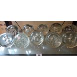 Ten clear glass 'dump' paperweights