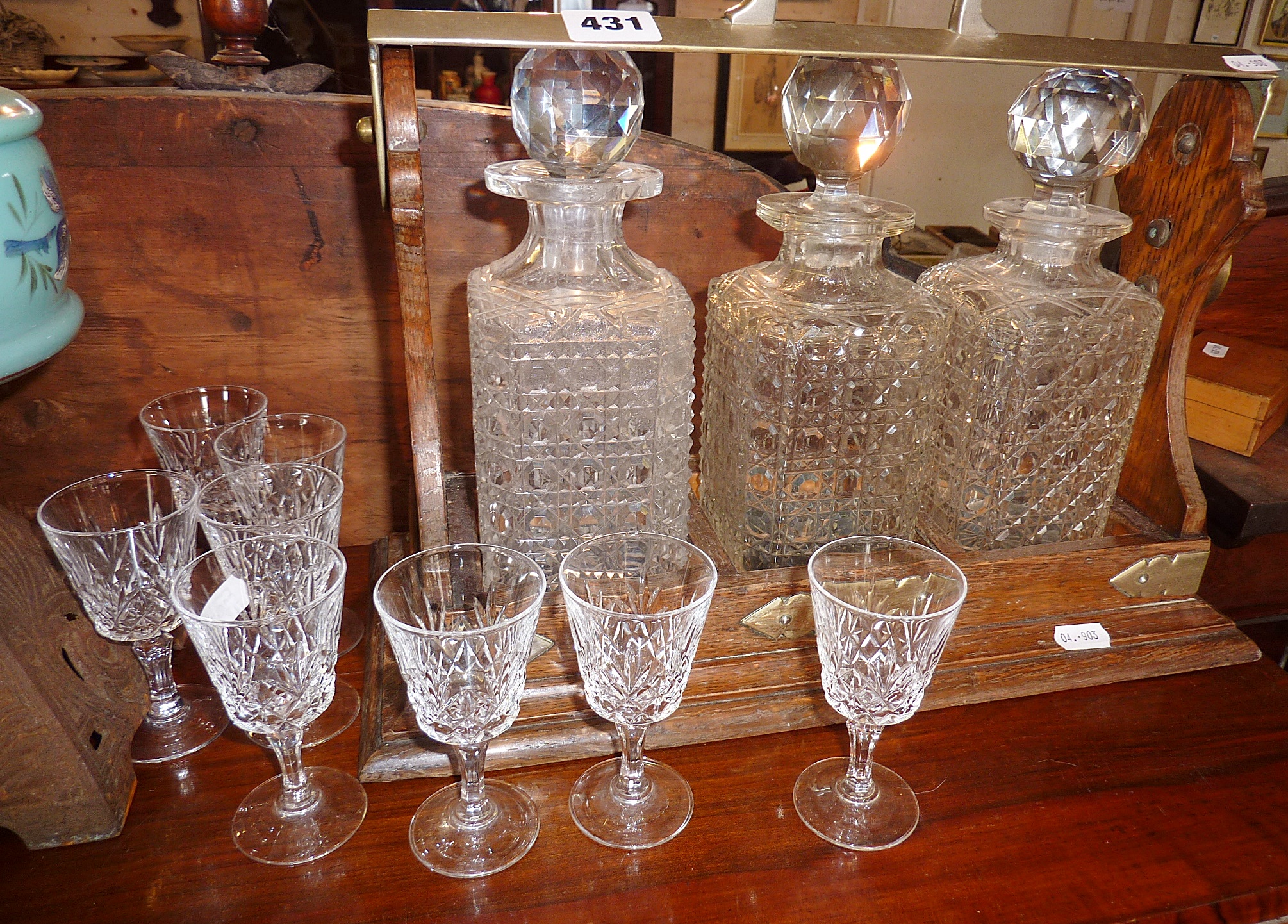 Hobnail cut glass 3-decanter oak tantalus, with a set of 8 sherry glasses