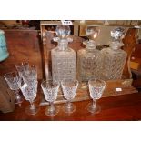 Hobnail cut glass 3-decanter oak tantalus, with a set of 8 sherry glasses