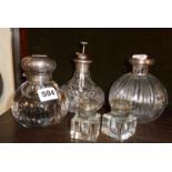Silver-topped, cut-glass scent bottles and a large inkwell? bottle (5)